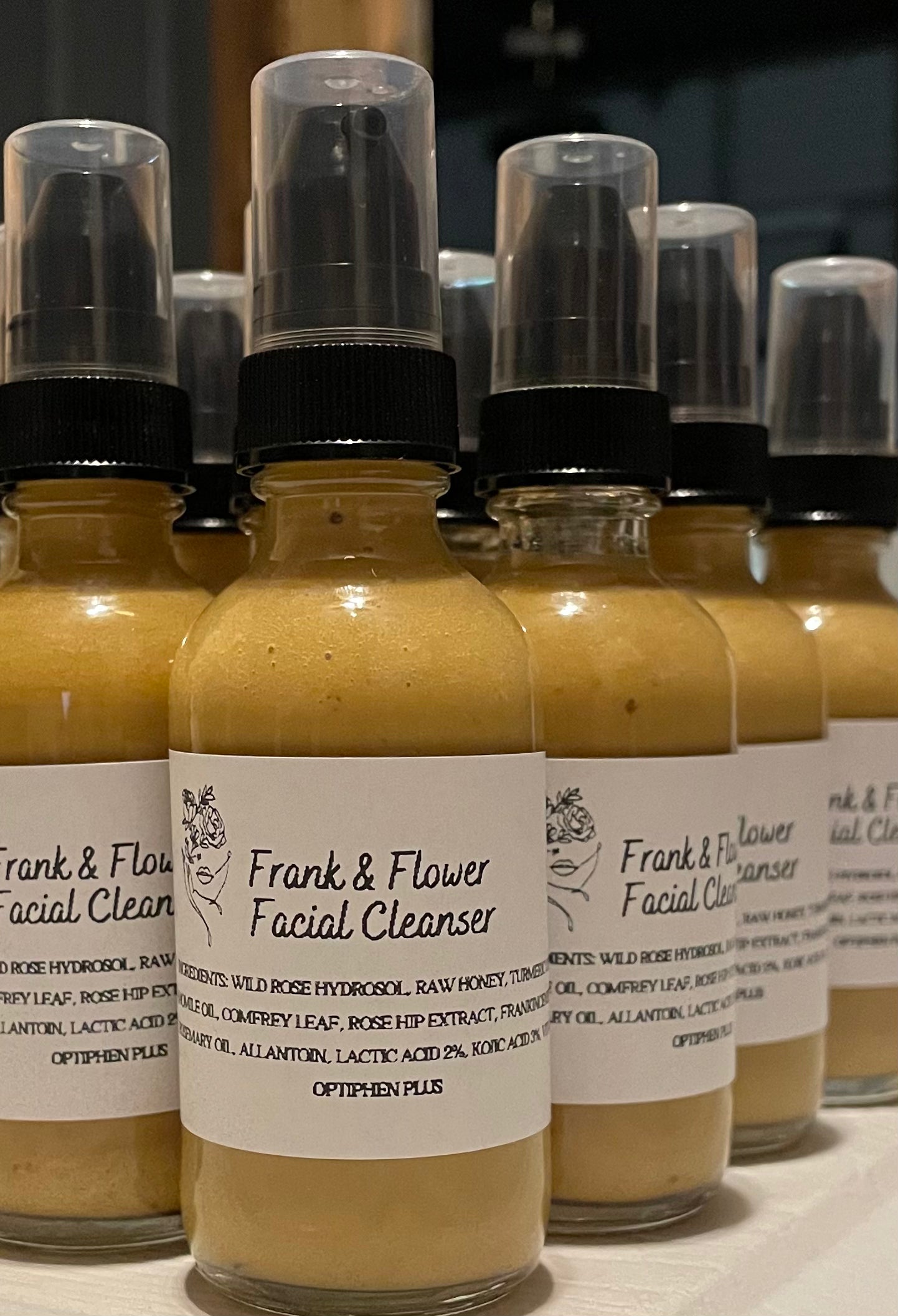 Frank & Flower Facial Cleanser 2 oz glass pump bottle.